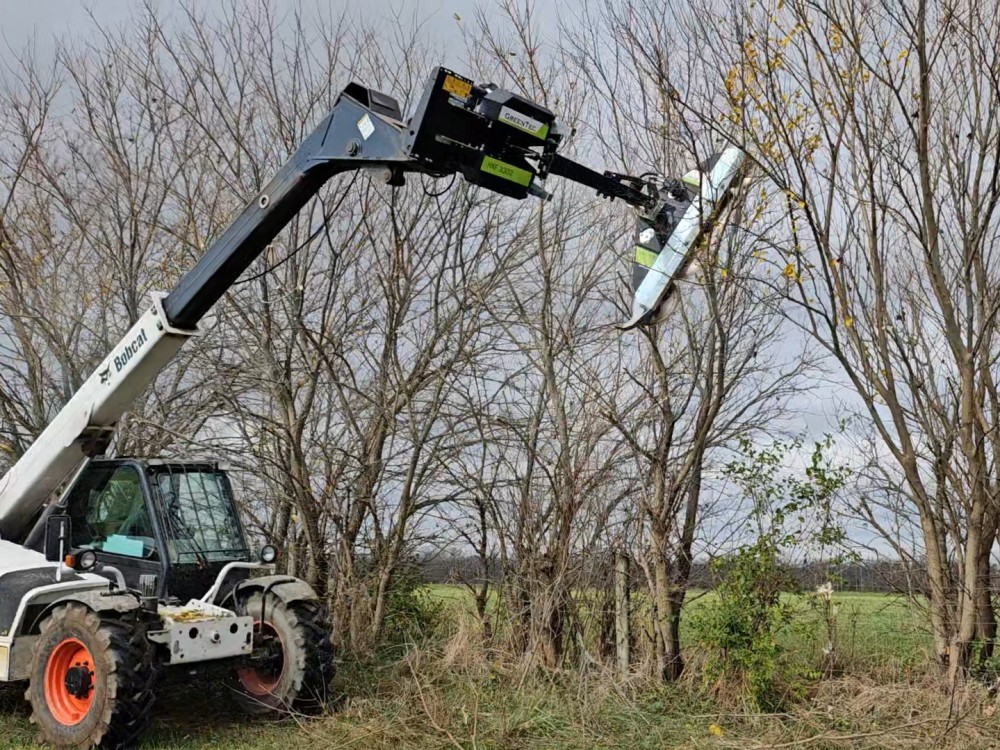 Box 3 Starkey Ag purchases a GreenTec 2002 LRS Quadsaw